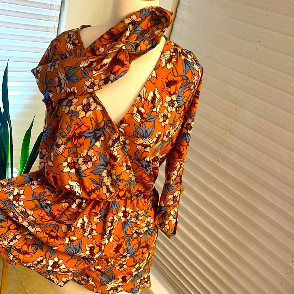Women’s little romper with shorts on the bottom.